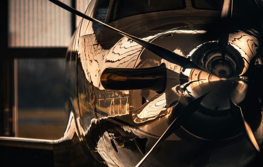 Turboprop aircraft in a hangar awaiting AOG support